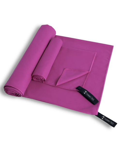 Mikrofaser Handtuch Fuchsia zusammengerollt kompakt – ideal für Reisen & Sport
